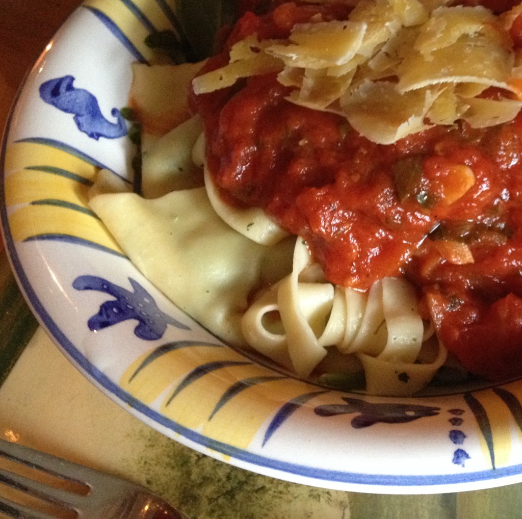 Ravioli and Fettuccine served with a basic tomato sauce