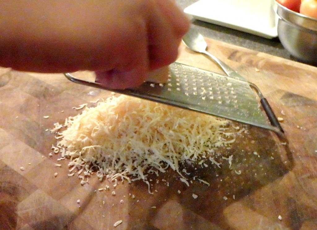 Grating the Romano cheese